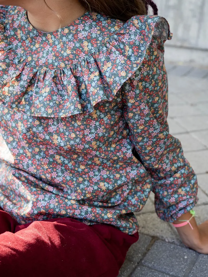 Blusa volante