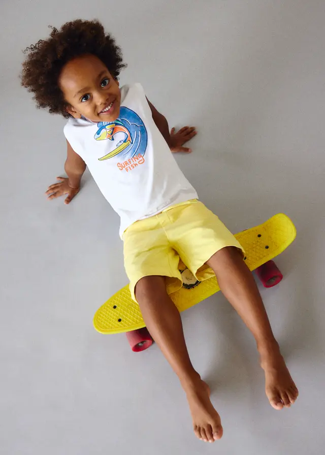 Camiseta pez surf