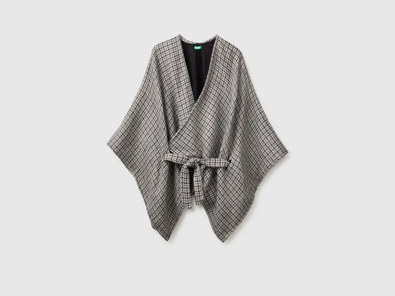 Reversible belted cape